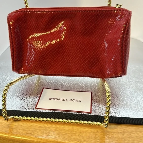 Michael Kors cosmetic bag or you could use it as a small purse. Beautiful red.‌ - Picture 3 of 6
